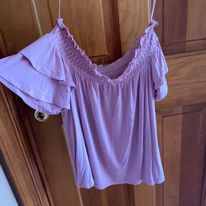 Adorable, flowy off the shoulder crop top.